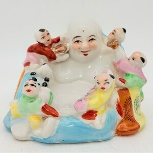 Vintage Chinese porcelain figurine Laughing Buddha surrounded by five children